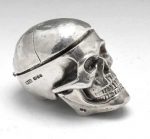A modern silver novelty snuff box realistically modelled as a skull