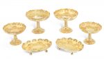 A suite of six Victorian silver-gilt tazze and dishes