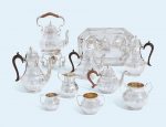 A SIX-PIECE VICTORIAN AND GEORGE V SILVER TEA AND COFFEE-SERVICE MARK OF GOLDSMITHS AND SILVERSMITHS COMPANY, LONDON AND SHEFFIELD, 1918, THE KETTLE, STAND AND LAMP LONDON, 1900, MAKER'S MARK WORN