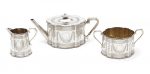A VICTORIAN THREE-PIECE SILVER TEA SERVICE by Henry Holland, London 1875