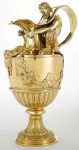 A Victorian silver-gilt "Sacred to Bacchus" ewer