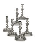 AN IMPORTANT SET OF SIX GEORGE I ROYAL SILVER CANDLESTICKS FIVE WITH MARK OF NICHOLAS CLAUSEN, LONDON, 1718, ONE APPARENTLY UNMARKED