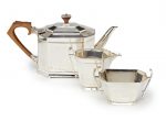 An Art Deco silver three piece tea service by Roberts & Belk Ltd., Sheffield 1936