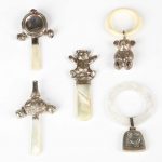 Group of Five Silver, Ivory and Mother-of-Pearl Teething Rings/Rattles