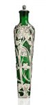 An Art Nouveau green glass and silver-mounted scent bottle by Goldmsiths & Silversmiths Co., Ltd, London 1903