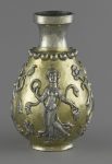 Bottle decorated with figures of female dancers