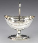 A George III Irish silver swing-handle sugar basket, with two marks, that of Daniel Egan and Clark & West, Dublin 1807