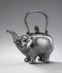 A HAMMERED SILVER KETTLE IN ELEPHANT FORM MEIJI-TAISHO PERIOD, EARLY 20TH CENTURY