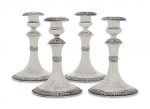 A SET OF FOUR AMERICAN SILVER CANDLESTICKS MARK OF TIFFANY & CO., NEW YORK, CIRCA 1895