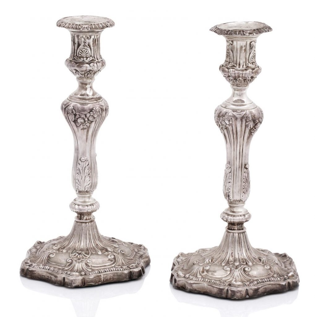 A pair of George III silver candlesticks by J. Roberts & Co., Sheffield 1812