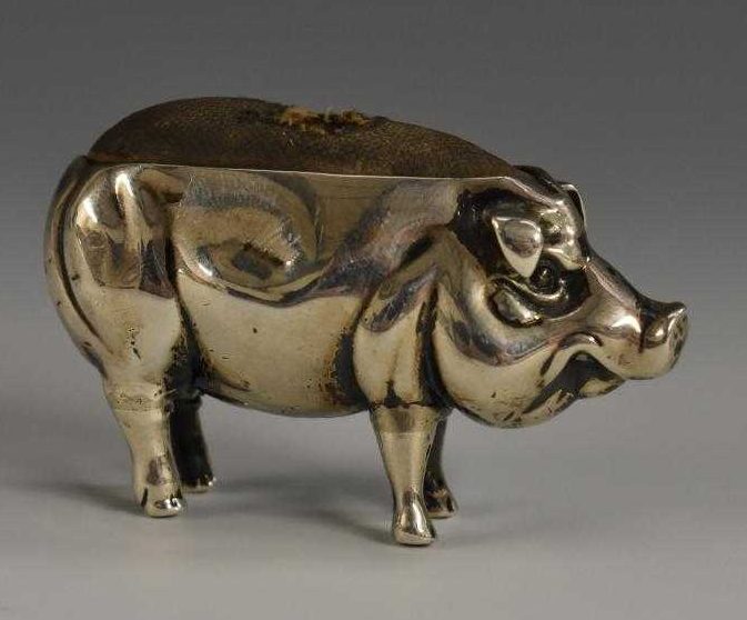 An Edwardian silver novelty pin cushion, as a pig